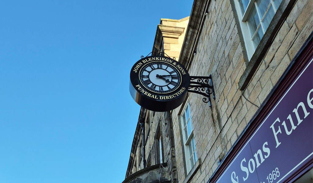 The clock outside John Blenkiron & Sons Funeral Directors Barnard Castle branch.